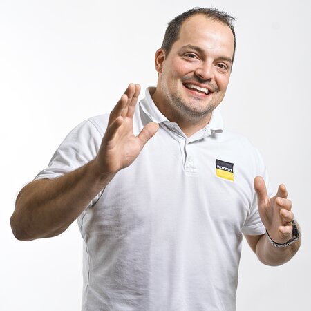 Team von Norma Reiden AG – Abteilung Projektleitung: Michael Hofer Portraitaufnahme von Michael Hofer, im Team – Projektleitung bei der Norma Reiden AG.